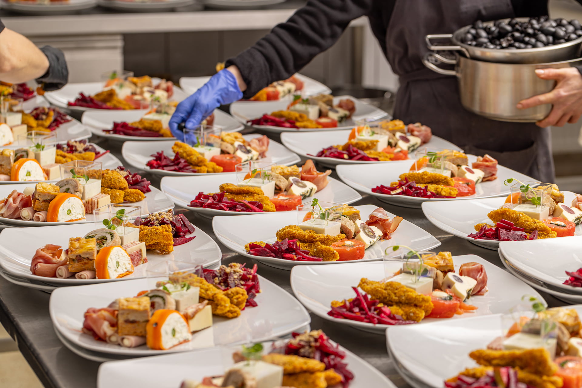 A chef arranging a plate